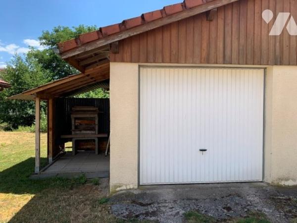 maison mitoyenne avec garage et terrain