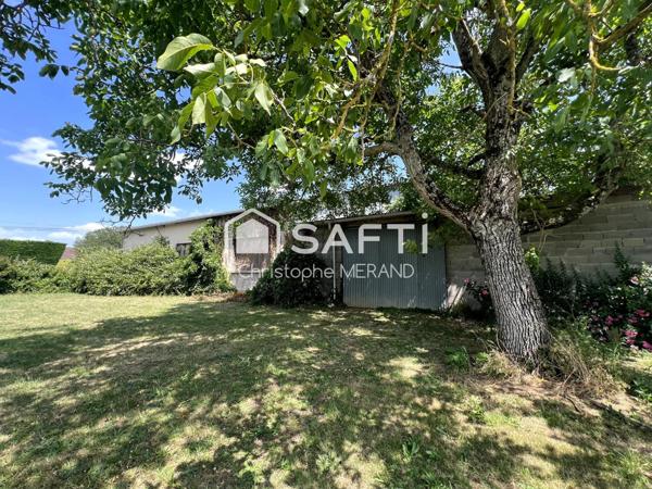 Grand hangar dans le centre de DANGE SAINT ROMAIN