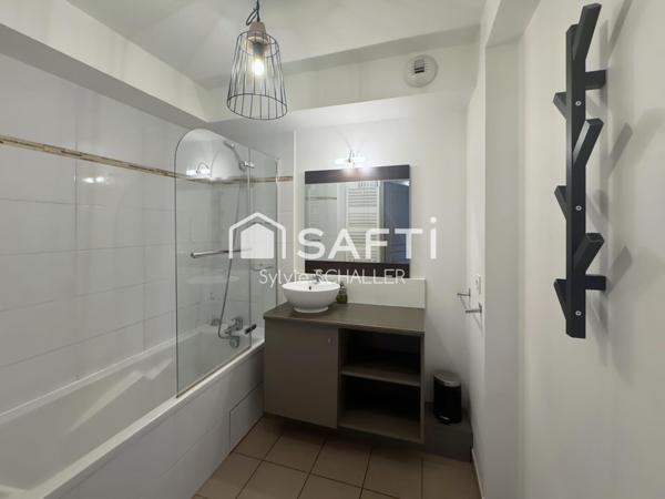 Appartement T3 climatisé, 1 balcon, 1 parking, 1 accès piscine