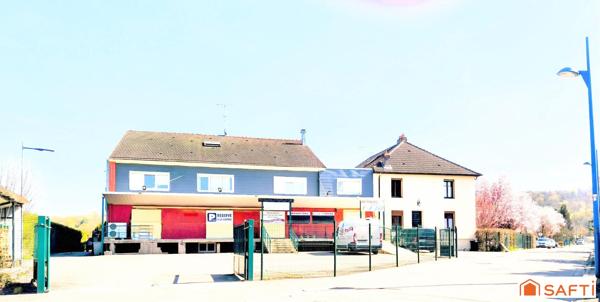 Spécial investisseur : vaste ensemble immobilier mixte incluant un local commercial et 4 appartements loués