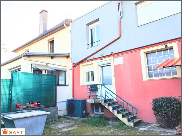Spécial investisseur : vaste ensemble immobilier mixte incluant un local commercial et 4 appartements loués