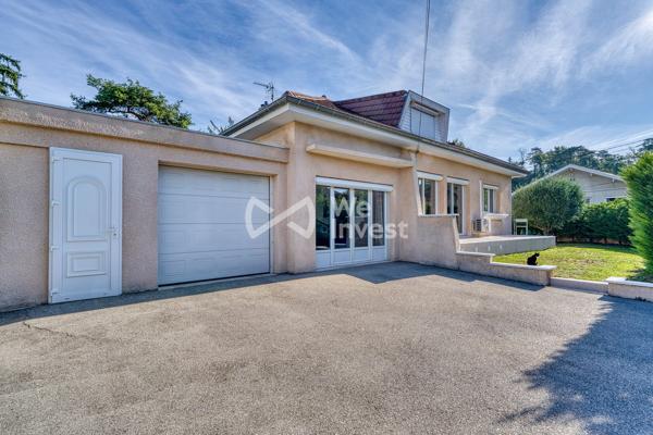 MEYZIEU - Maison familiale de 150 m² avec piscine, garage de 45 m² et climatisation.
