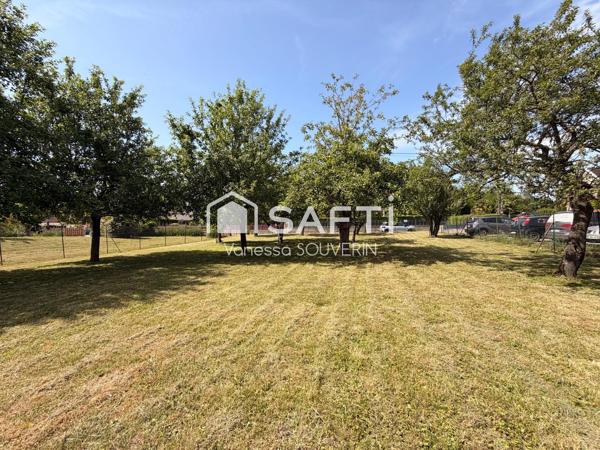 Terrain constructible avec nombreux fruitiers clos