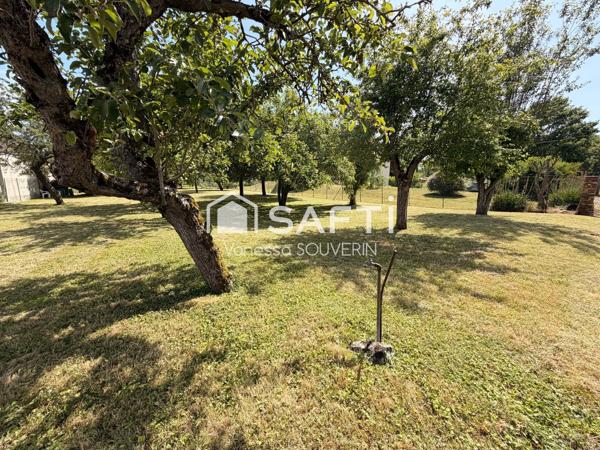 Terrain constructible avec nombreux fruitiers clos
