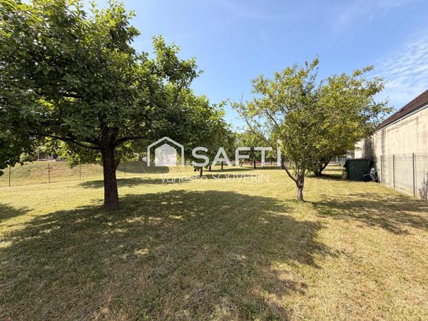 Terrain constructible avec nombreux fruitiers clos