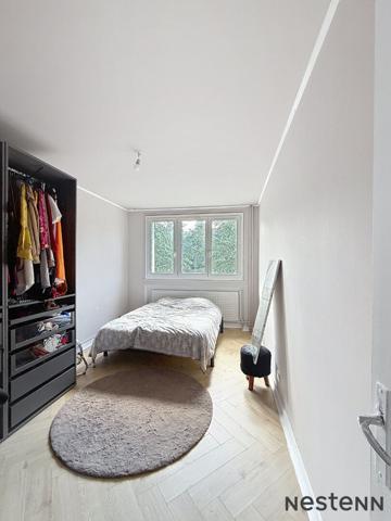 Appartement 2 chambres, lumineux, rénové avec goût - garage compris