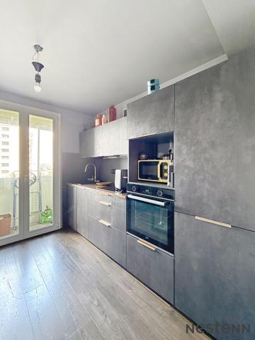 Appartement 2 chambres, lumineux, rénové avec goût - garage compris