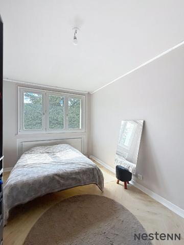 Appartement 2 chambres, lumineux, rénové avec goût - garage compris