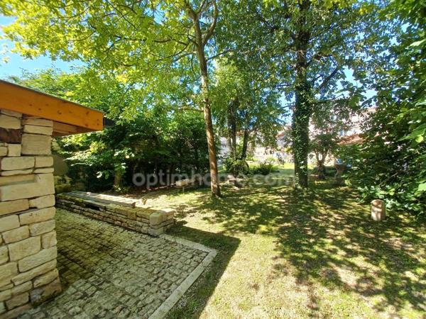 Spacieuse maison familiale à vendre, 4 chambres, grand garage et magnifique jardin