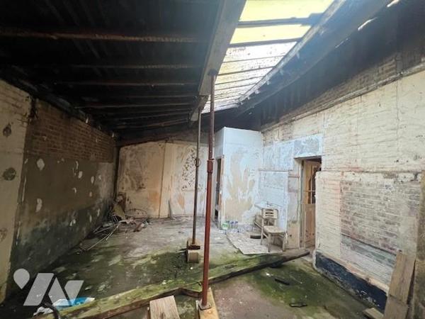 ORBEC CENTRE VILLE JOLIE PROPRIETE DONT PARTIE CLASSEE A RENOVER