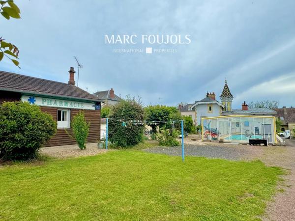 Maison Belle Époque de 182 m² habitable sur un terrain de1863 m² avec dépendances, piscine chauffée, potager et garages couverts