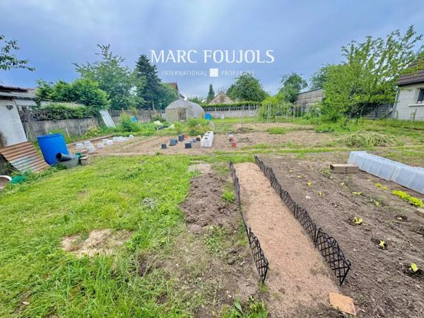 Maison Belle Époque de 182 m² habitable sur un terrain de1863 m² avec dépendances, piscine chauffée, potager et garages couverts