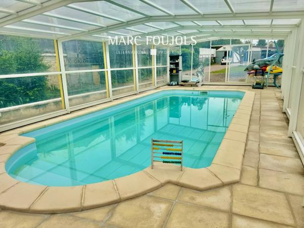 Maison Belle Époque de 182 m² habitable sur un terrain de1863 m² avec dépendances, piscine chauffée, potager et garages couverts