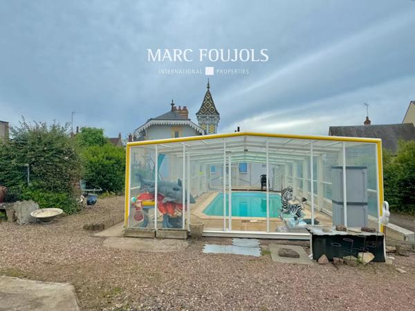 Maison Belle Époque de 182 m² habitable sur un terrain de1863 m² avec dépendances, piscine chauffée, potager et garages couverts