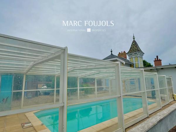 Maison Belle Époque de 182 m² habitable sur un terrain de1863 m² avec dépendances, piscine chauffée, potager et garages couverts