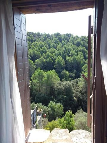 Maison de village en pierre atypique  au cœur du charmant village de Saumane.