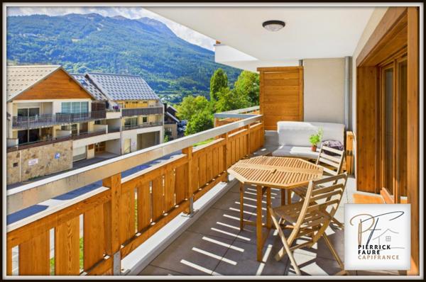 T3 avec terrasse plein sud, vue montagnes, garage et cave à Briançon