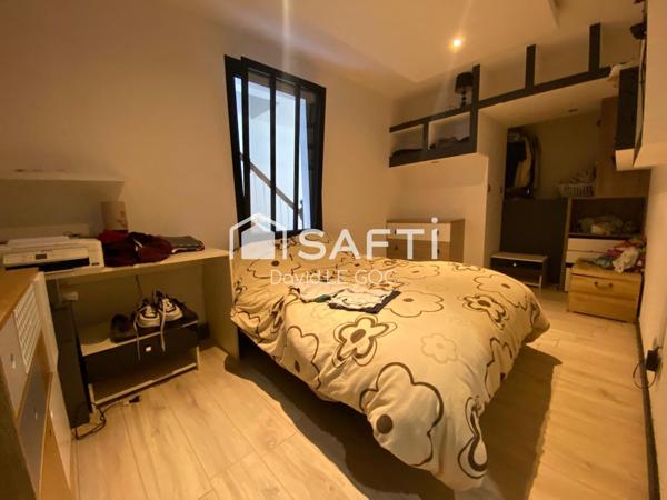 en plein couer du centre-ville, bien atipyque, rénovation de qualité, garage motorisé