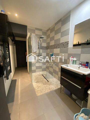 en plein couer du centre-ville, bien atipyque, rénovation de qualité, garage motorisé