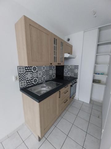 Appartement duplex 42.60m² avec jardinet et garage