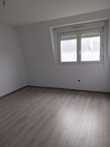 Appartement duplex 42.60m² avec jardinet et garage