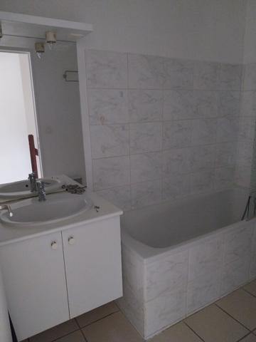 Appartement duplex 42.60m² avec jardinet et garage