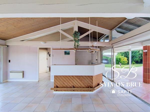 Maison familiale avec piscine, parc arboré et fort potentiel