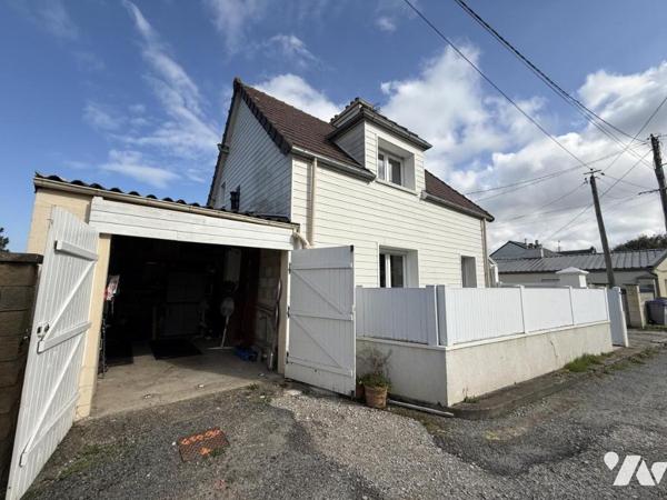 TOURLAVILLE, secteur calme; maison individuelle avec terrasse et garage