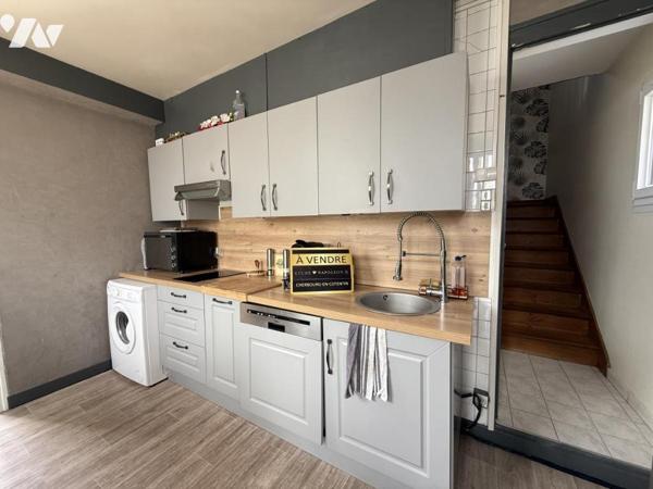 TOURLAVILLE, secteur calme; maison individuelle avec terrasse et garage