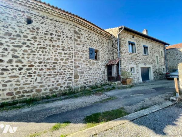 Charmante maison en pierres rénovée avec jardin et garages