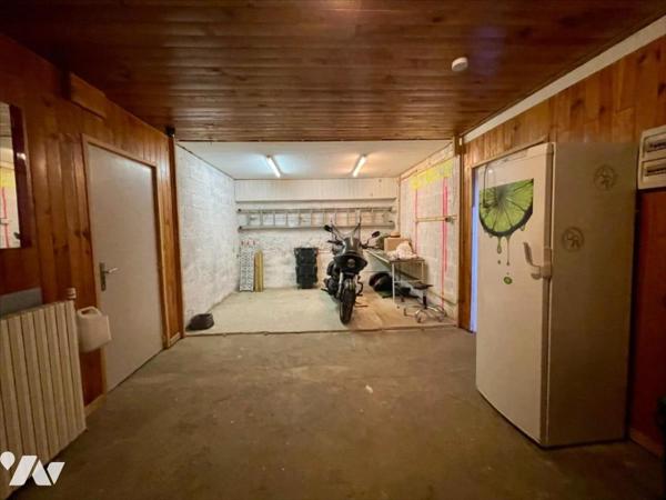 Charmante maison en pierres rénovée avec jardin et garages