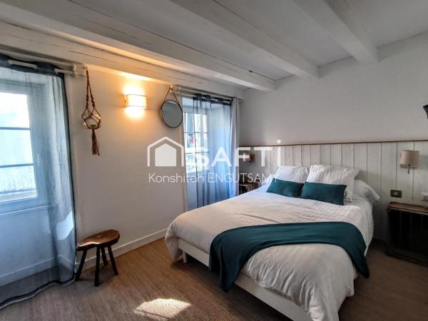 Maison de ville de 235m², 5 chambres, située dans une rue historique piétonne