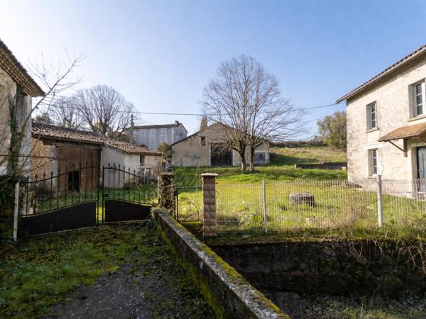 Moulin avec maison, dépendances et 1.5 ha prairies