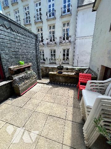 Rue du Château - Un studio idéalement situé dans une rue piétonne, au sein d'une petite copropriété.