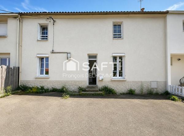 Maison mitoyenne 91m2, 2 chambres, bureau 18m2 et terrain clôturé