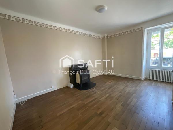 Maison mitoyenne 91m2, 2 chambres, bureau 18m2 et terrain clôturé