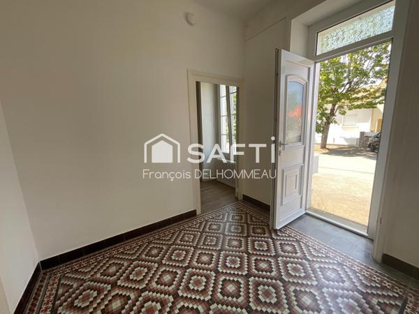 Maison mitoyenne 91m2, 2 chambres, bureau 18m2 et terrain clôturé