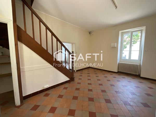 Maison mitoyenne 91m2, 2 chambres, bureau 18m2 et terrain clôturé
