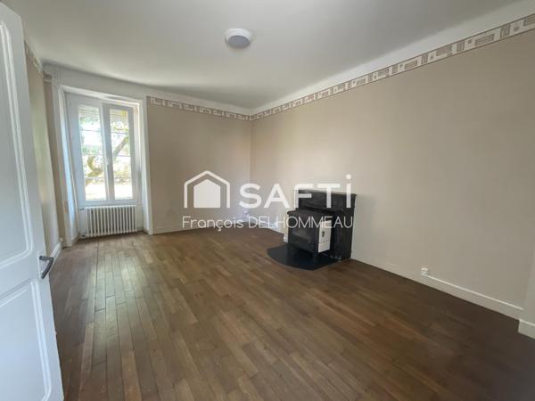 Maison mitoyenne 91m2, 2 chambres, bureau 18m2 et terrain clôturé