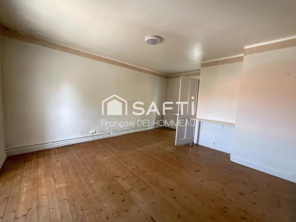 Maison mitoyenne 91m2, 2 chambres, bureau 18m2 et terrain clôturé