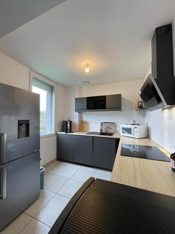 Appartement T3 en rdc rénové à proximité des commerces de Perrigny