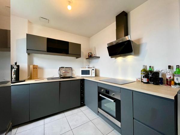 Appartement T3 en rdc rénové à proximité des commerces de Perrigny