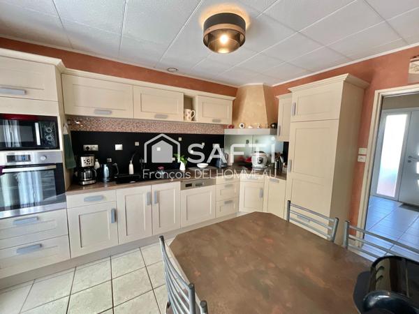 Maison familiale de 95 m², 3 chambres et un bureau sur un terrain de 950 m²