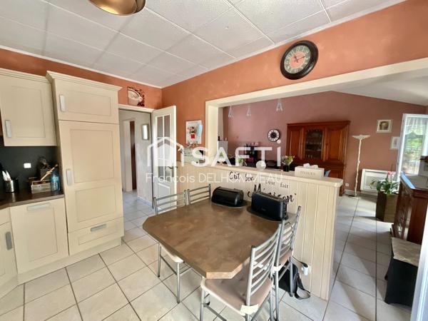 Maison familiale de 95 m², 3 chambres et un bureau sur un terrain de 950 m²