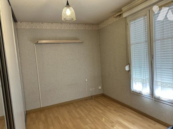 CHATEAU-THIERRY. Appartement de type 3 de 65,50 m² avec 2 chambres, place de parking et garage