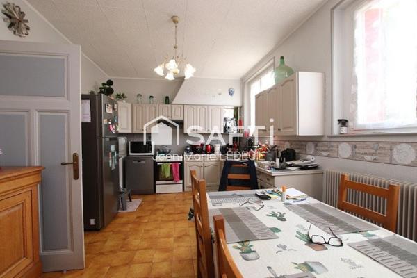 Maison 4 chambres, garage, dépendance et jardin.