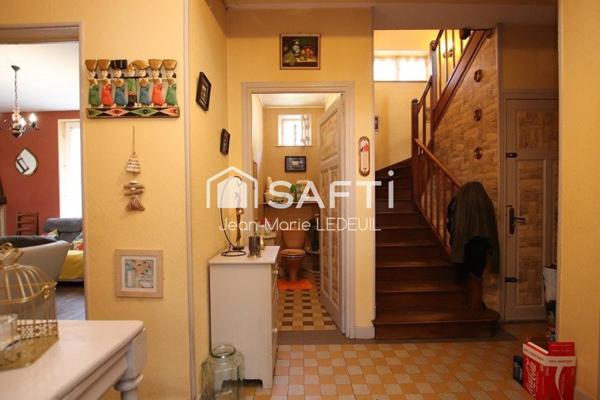 Maison 4 chambres, garage, dépendance et jardin.