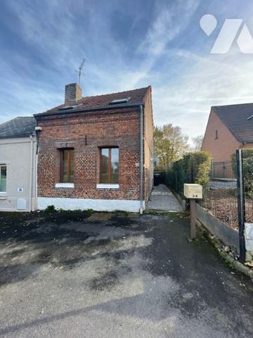 UNE MAISON A USAGE D'HABITATION