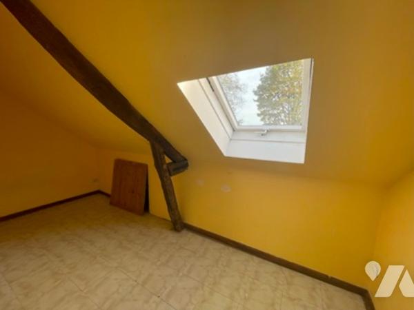 UNE MAISON A USAGE D'HABITATION