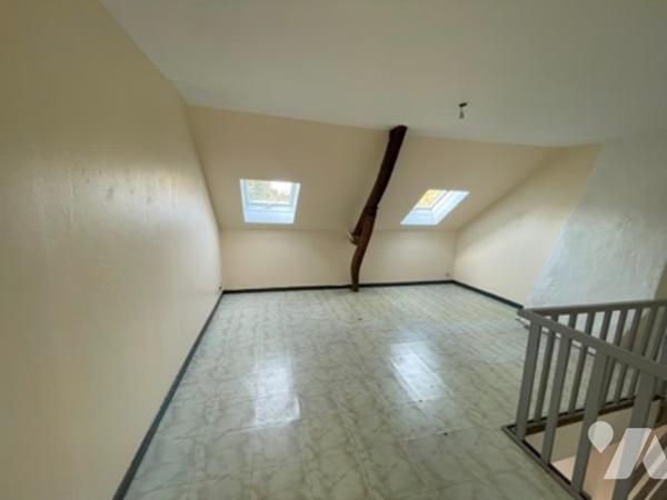 UNE MAISON A USAGE D'HABITATION